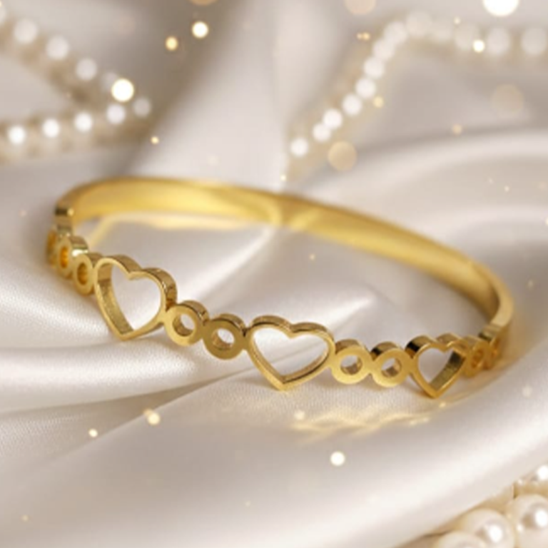 regular product photo of gold heart bracelet before professional editing